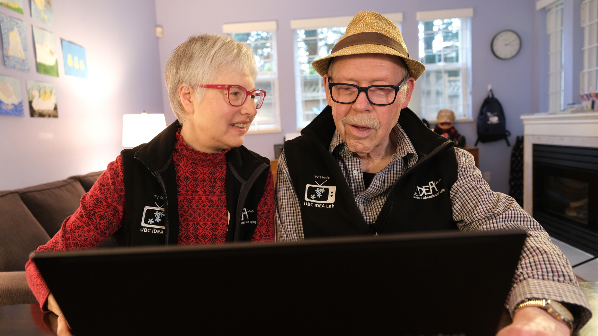 Cindy and Lester watching a Zinnia TV video