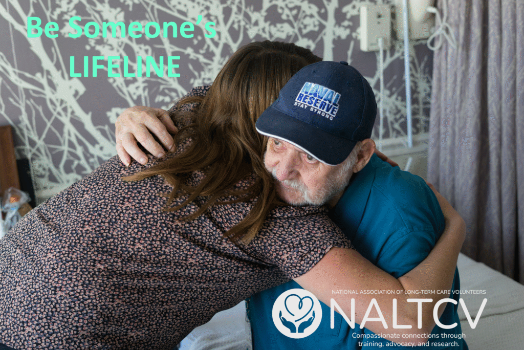 Female volunteer hugging an older man