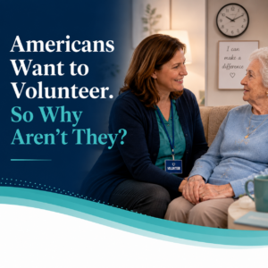 A companion volunteer talking with an older woman.